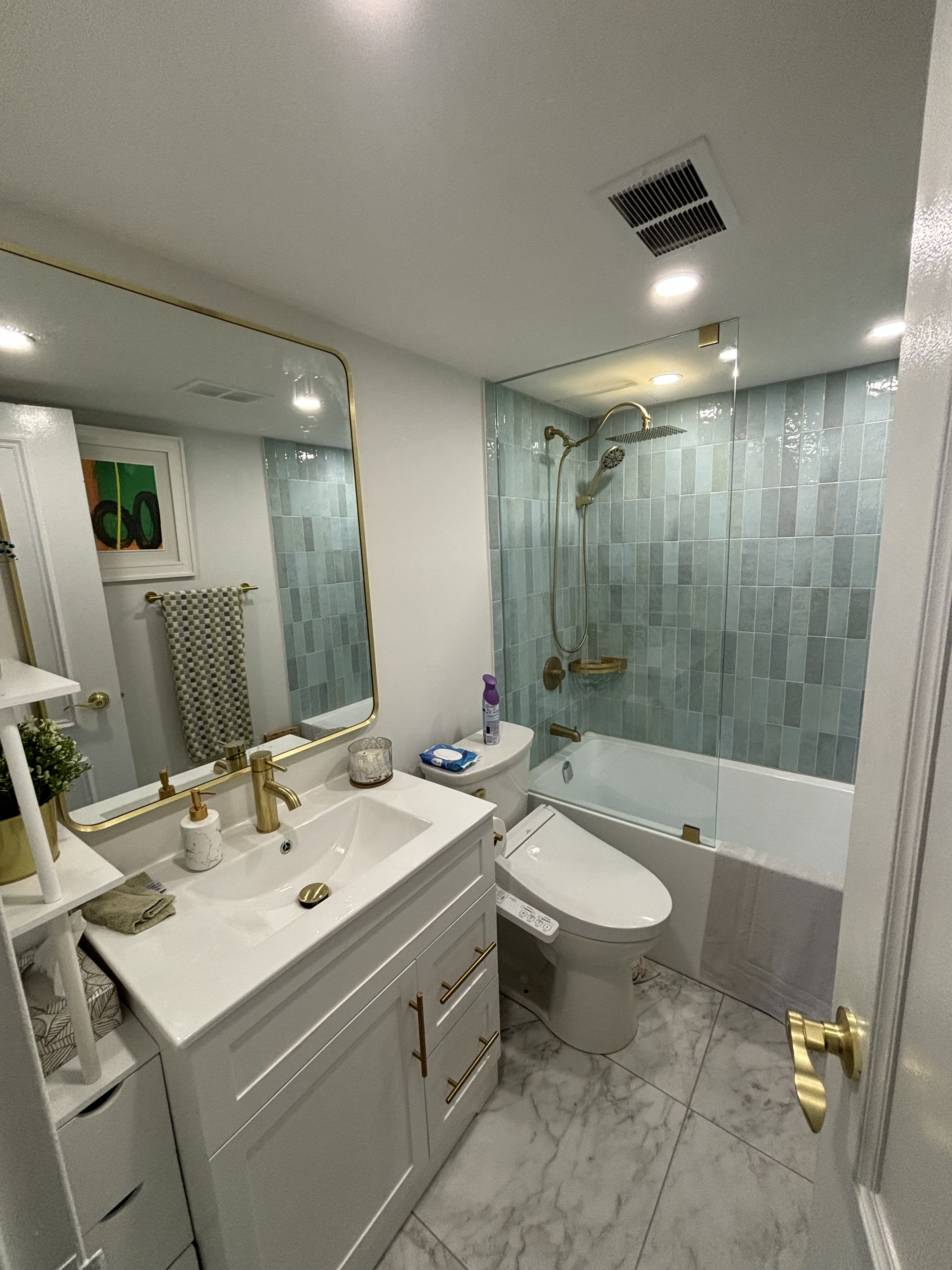 Completed bathroom renovation with modern fixtures